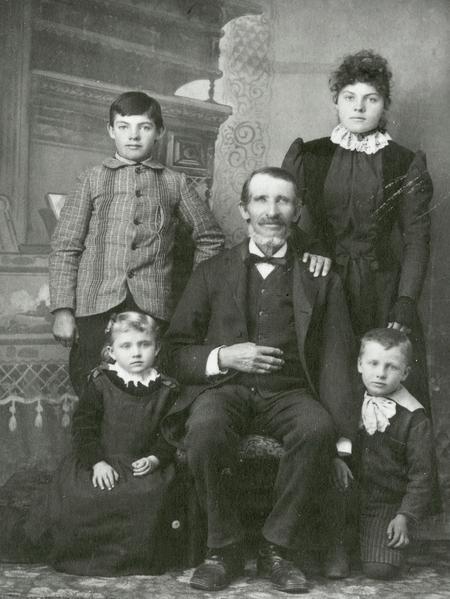 Photograph, photographer unknown, 1893. (Church History Library, Salt Lake City.) This photograph, taken at the 1893 World’s Fair in Chicago, shows Coray with grandchildren Eppie and Sidney Coray (seated) and step-grandchildren Laban and Elizabeth Harding.